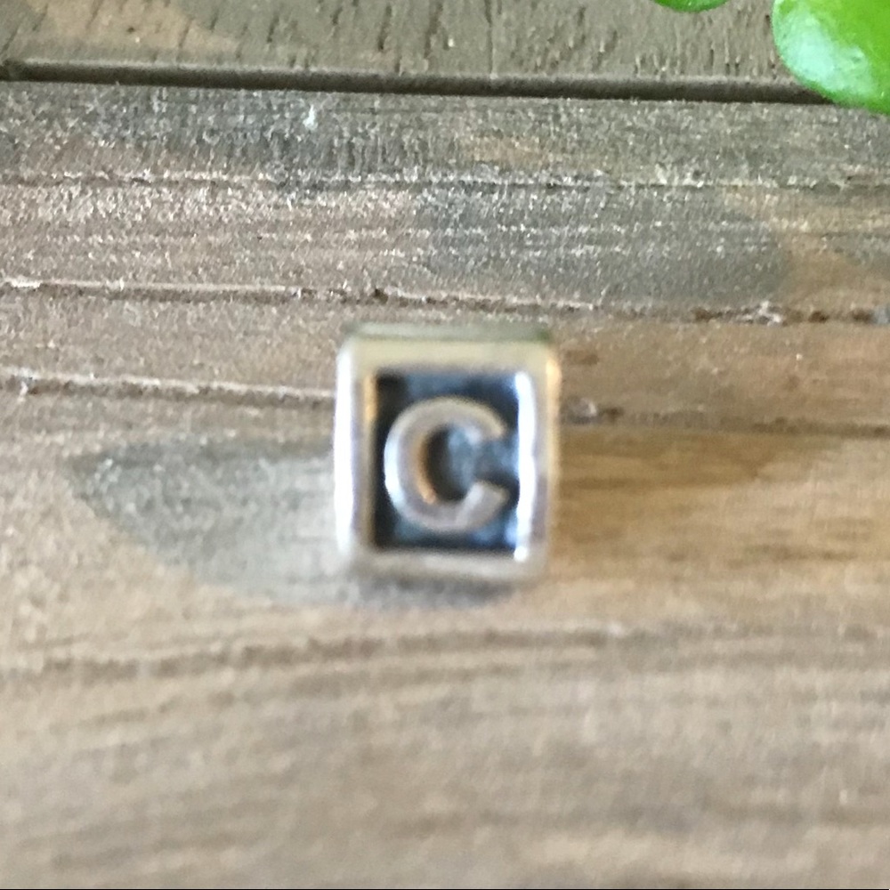 Pandora letter “C” initial block